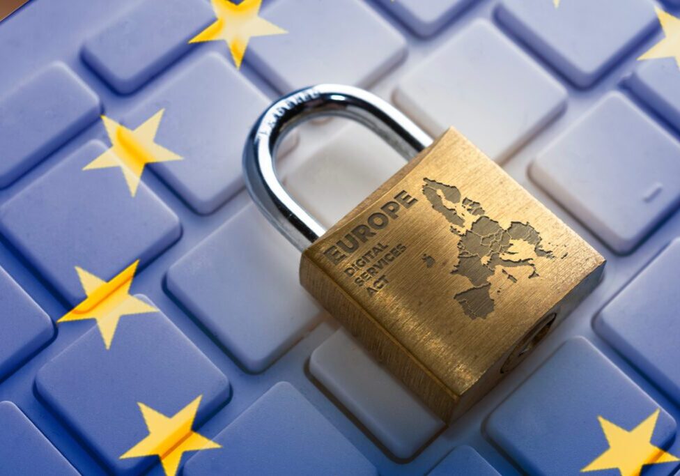 A padlock on top of a keyboard with european stars.